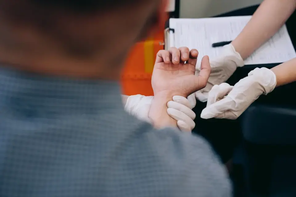 A veterinarian examining a dog on an exam table