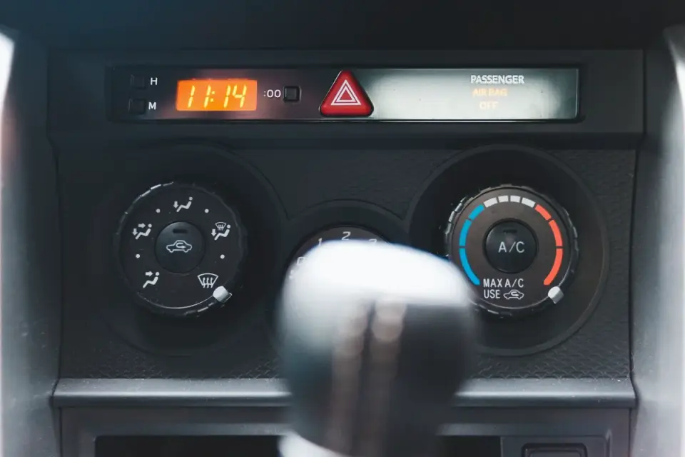 Close-up of an airbag warning label on a vehicle&#x27;s dashboard